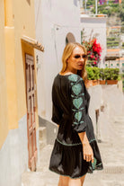 black cotton beach dress with aqua embroidery by Lindsey Brown