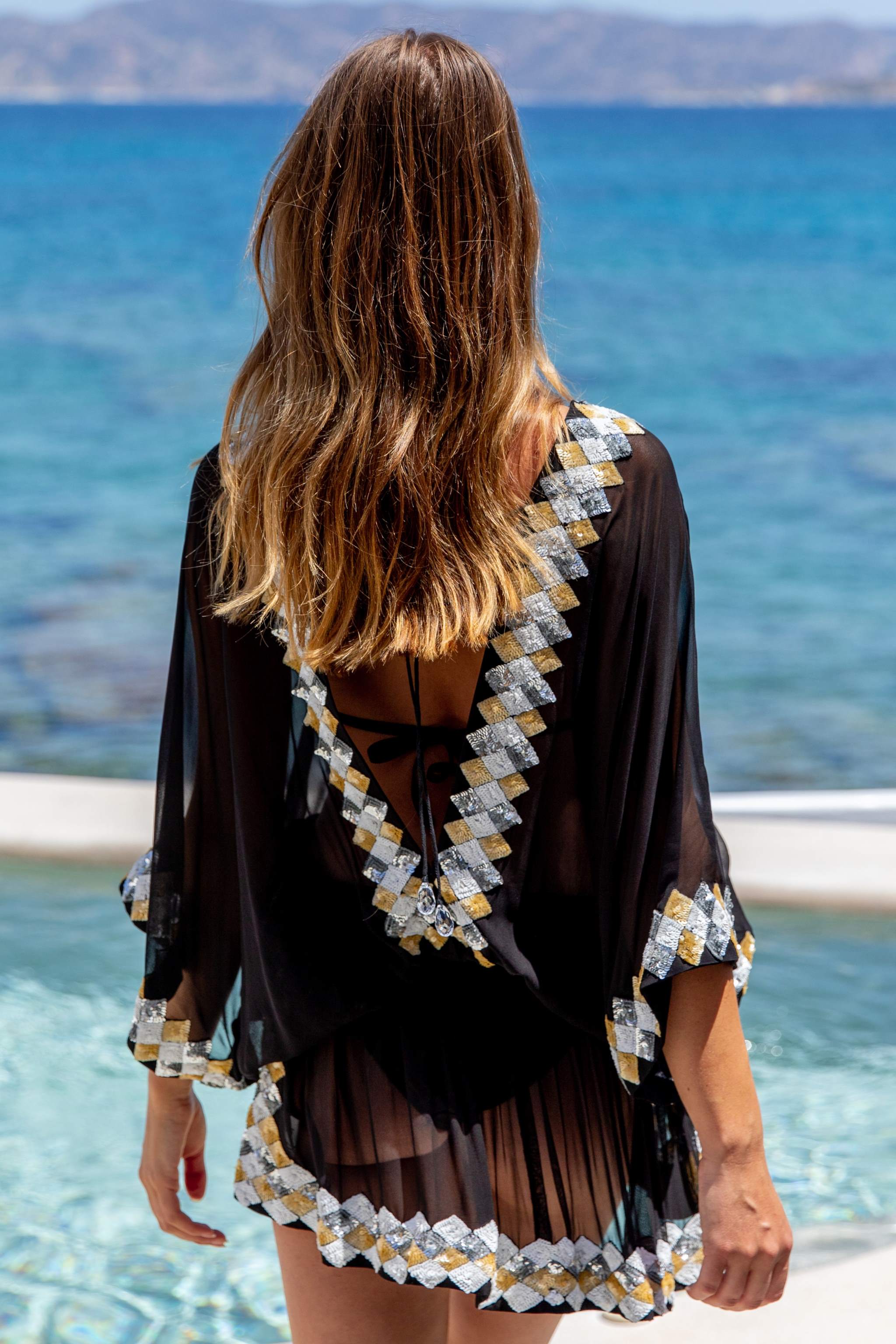 Black sequinned silk kaftans by Lindsey Brown silk resort wear 