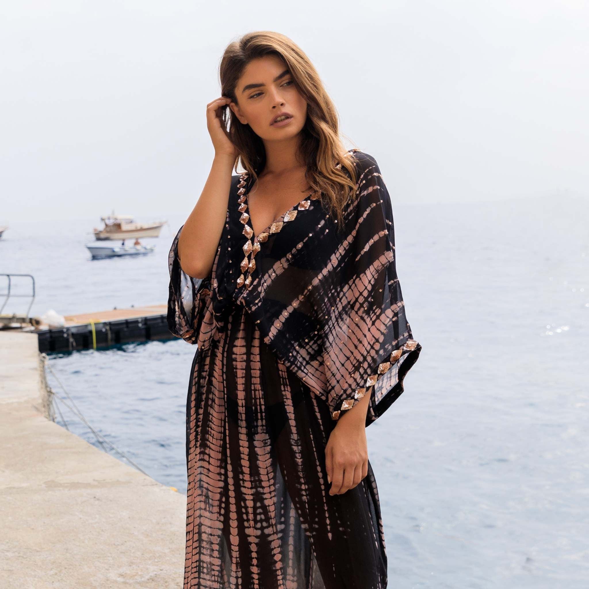 Black silk maxi kaftans by Lindsey Brown luxury resort wear