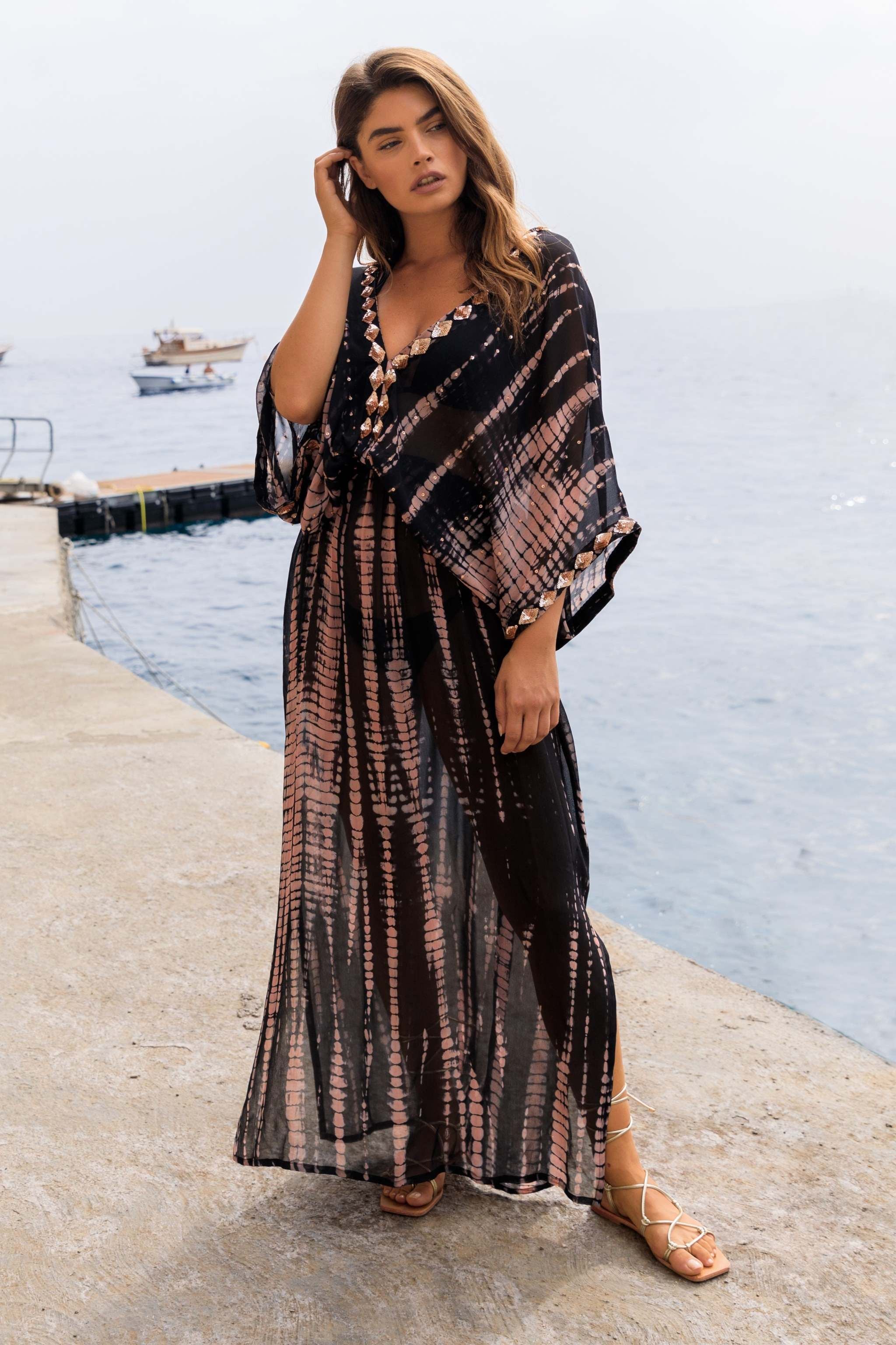 Black silk maxi kaftans by Lindsey Brown luxury resort wear 
