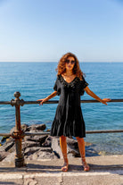 Black cotton loose fitting beach dresses by Lindsey Brown 