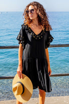 black cotton beach dresses to wear on holiday by  Lindsey Brown resort wear 