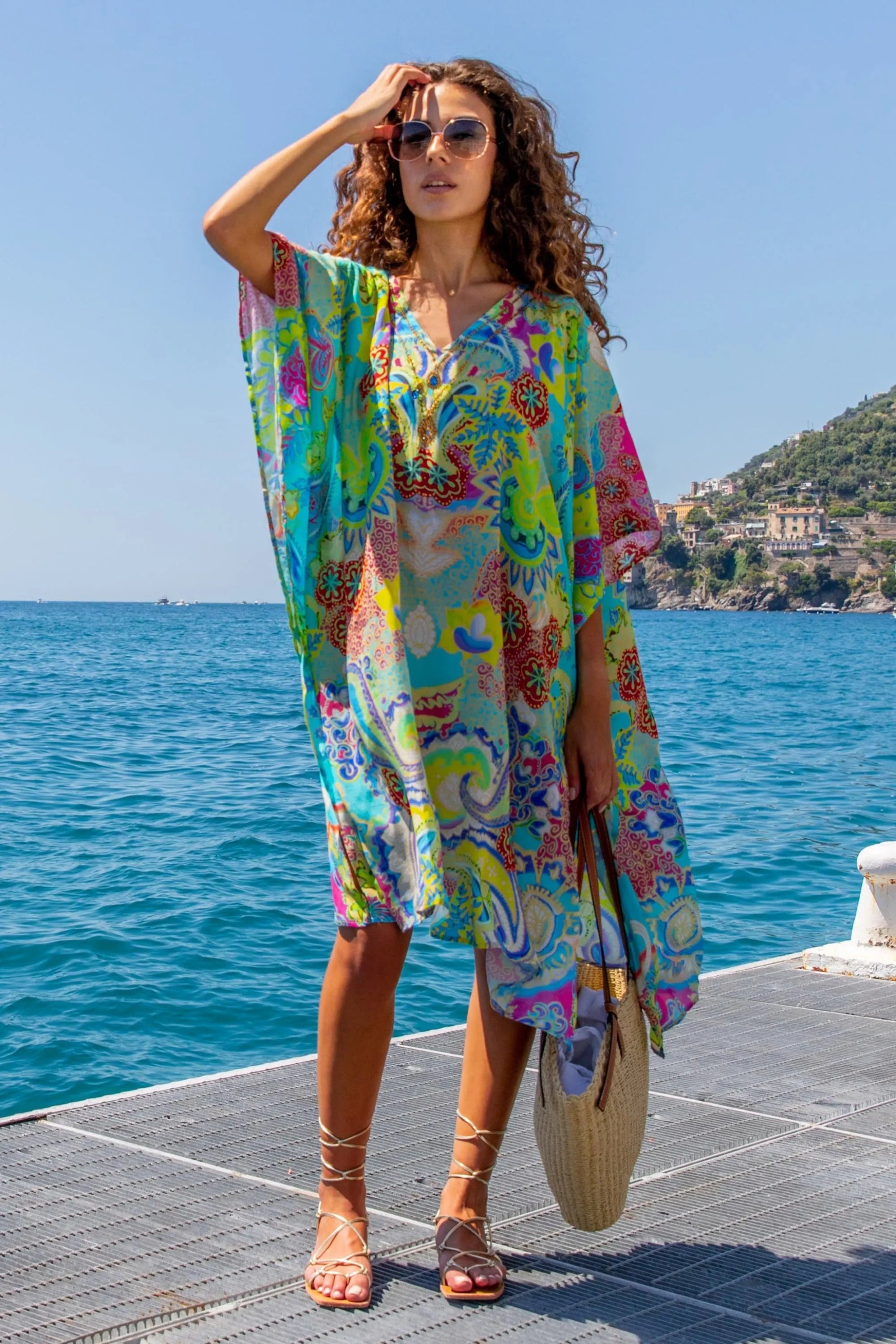 Silk beach cover up in printed turquoise and yellow silk by Lindsey Brown designer resort wear