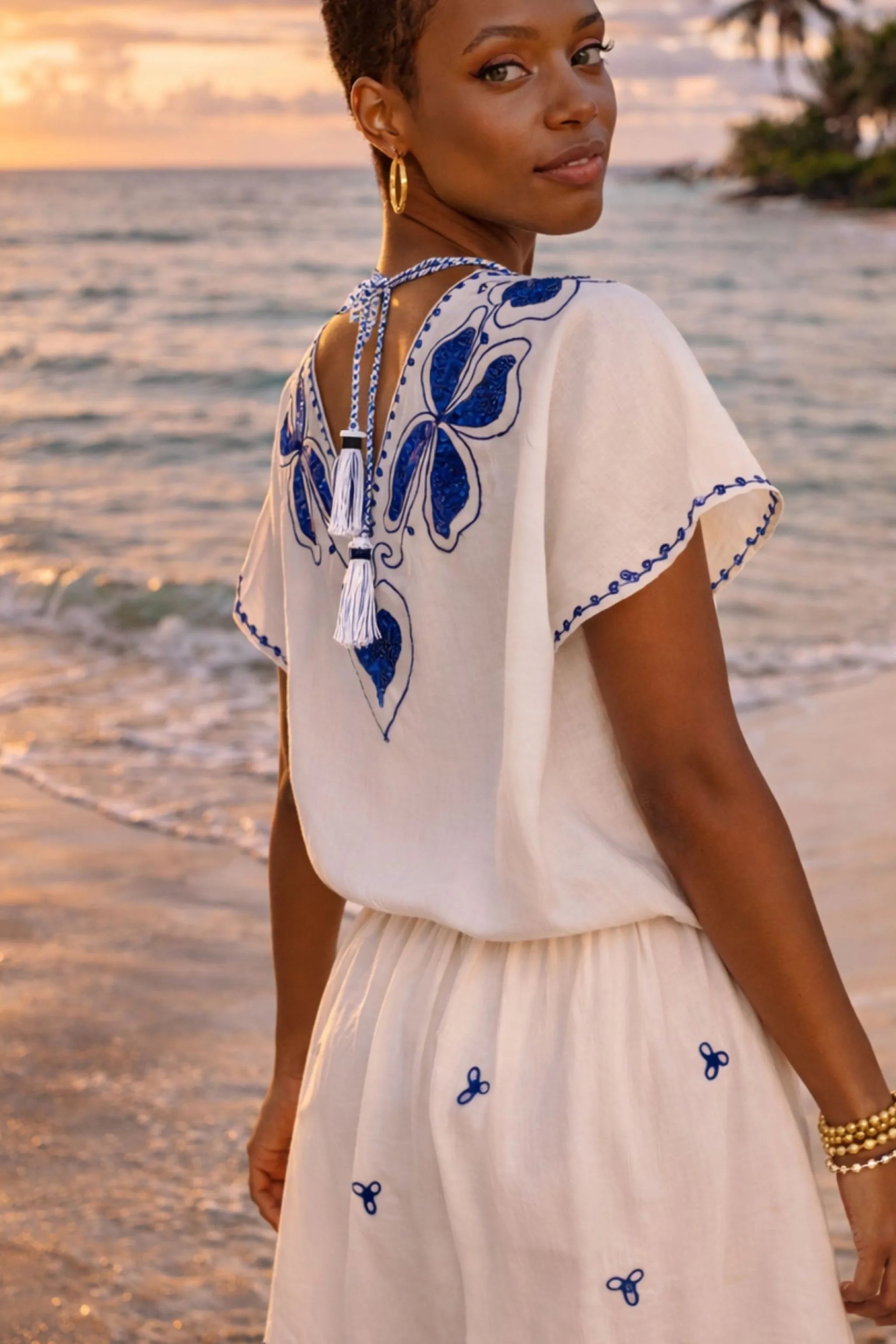 white cotton designer v back beach dress for caribbean holidays by lindsey brown resort wear