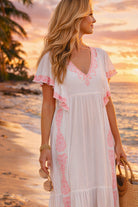 white midi maxi cotton beach dress with pink embroidery to wear in the Caribbean