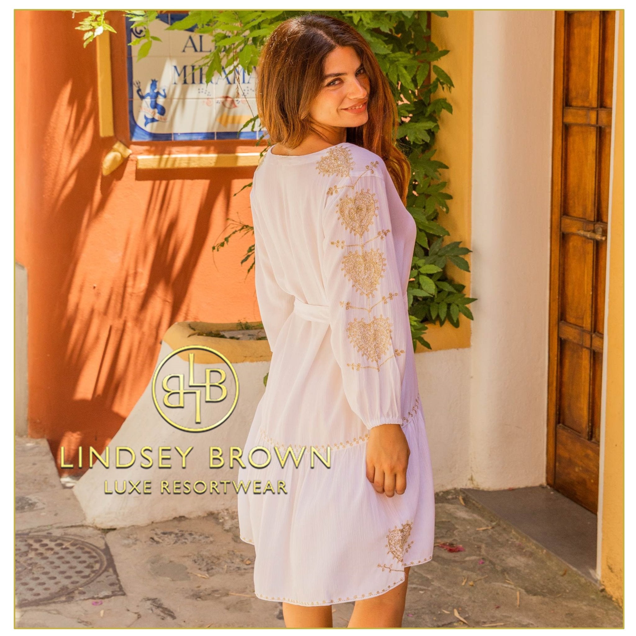 white cotton beach dress to wear on a Caribbean Cruise by Lindsey Brown resort wear 