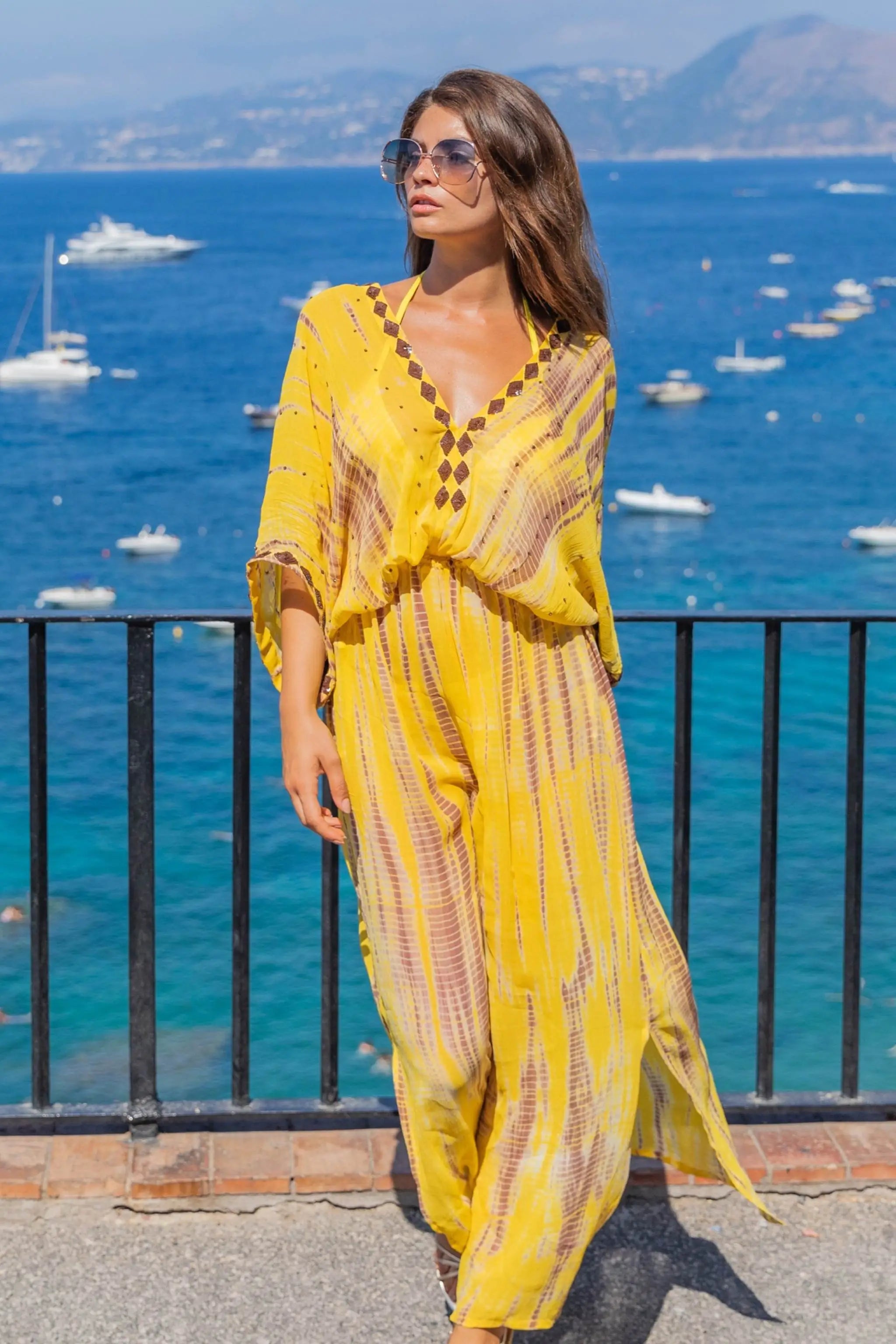 Yellow silk maxi kaftans to wear on holiday by Lindsey Brown resort wear