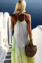 Yellow silk maxi dresses to wear in Santorini by Lindsey Brown resort wear worn by Anna Mavridis